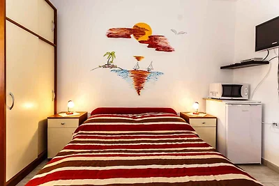 Studio mit Balkon und Klimaanlage