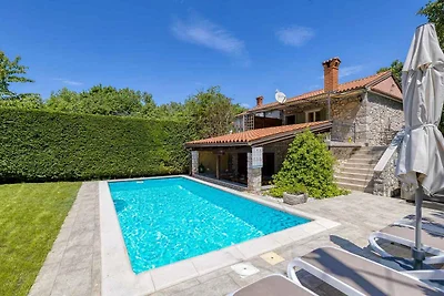 Ferienhaus mit Terrasse, Garten und privatem