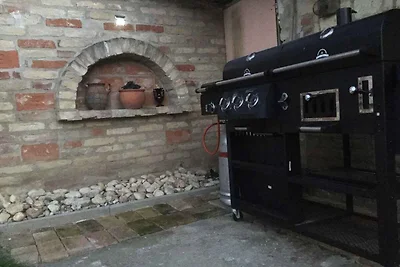 Ferienhaus mit Waschmaschine und Ofen im
