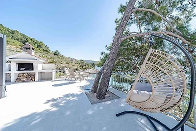 Ferienhaus mit Terrasse und Meerblick