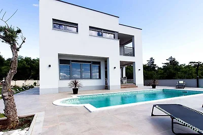 Ferienhaus mit Pool und Meerblick