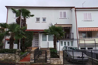 Ferienhaus mit Balkon und Klimaanlage