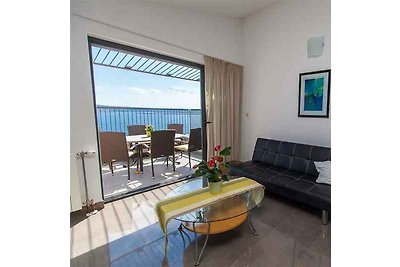 Ferienwohnung mit Terrasse und Meerblick in r