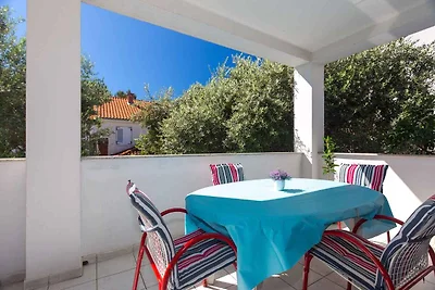 Ferienwohnung mit einer überdachten Terrasse