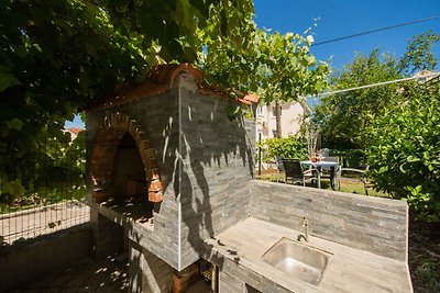 Ferienwohnung mit Garten und Klimaanlage