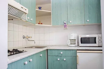 Ferienwohnung in einem Apartmenthaus mit Pool