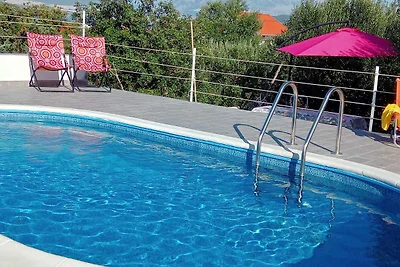 Ferienwohnung mit einem Gemeinschaftspool mit