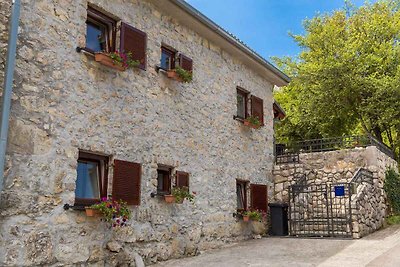 Ferienhaus mit Garten und Klimaanlage