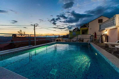 Ferienhaus mit Aussenpool und Meerblick