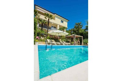 Ferienwohnung mit Balkon und gemeinsamen Pool