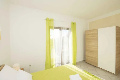 Appartamento Vacanza con famiglia Pirovac