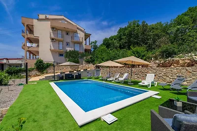 Ferienwohnung mit Pool und Meerblick