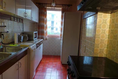 Ferienhaus mit Balkon und Klimaanlage