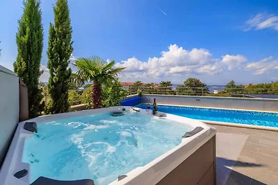 Ferienhaus mit Swimmingpool und Meerblick