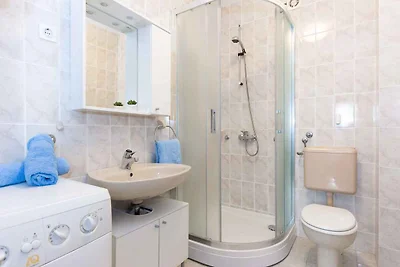 Ferienwohnung mit einer überdachten Terrasse