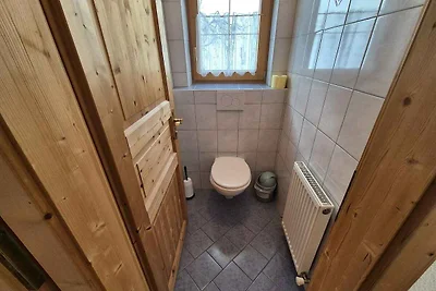 Ferienhaus mit Balkon und Garten