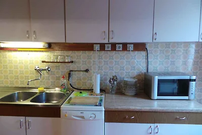Ferienhaus mit Balkon und Klimaanlage