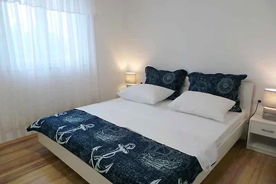 Ferienwohnung mit Pool und Meerblick