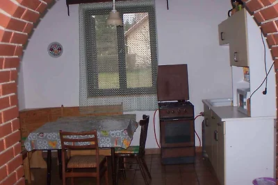 Ferienhaus mit Balkon und Gartenmöbel