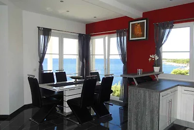 Ferienwohnung mit Poolnutzung und Meerblick