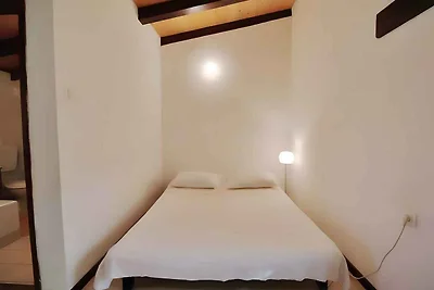 Studio mit TV und Terrasse