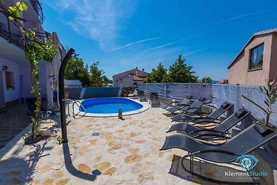 Ferienwohnung mit Poolnutzung und Meerblick