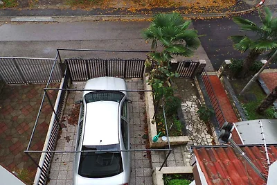 Ferienhaus mit Balkon und Klimaanlage