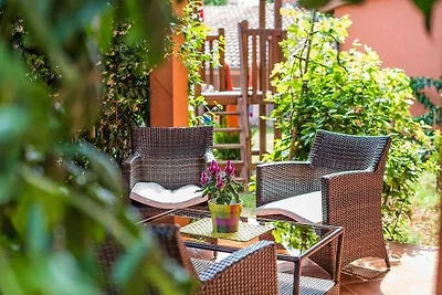 Ferienwohnung mit Garten und Klimaanlage