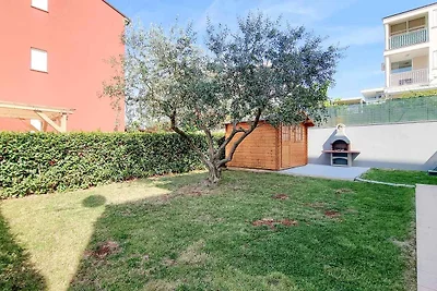 Ferienwohnung mit einer mit Tisch, Stühlen un