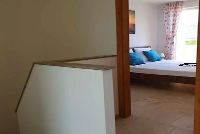 Ferienwohnung mit einen Balkon und Meerblick