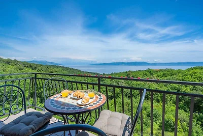 Ferienwohnung mit Pool und Meerblick