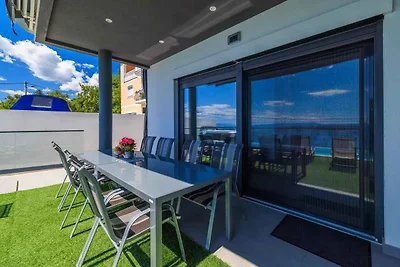 Ferienhaus mit Pool und Meerblick