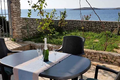 Ferienwohnung Erste Reihe am Meer (10 m)