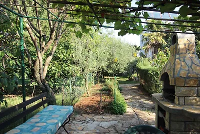 Ferienwohnung mit Garten und Klimaanlage
