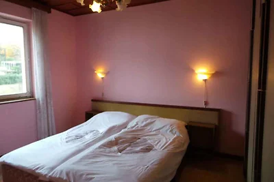 Ferienhaus mit Balkon und Klimaanlage
