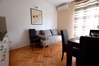 Ferienwohnung mit Garten und Klimaanlage
