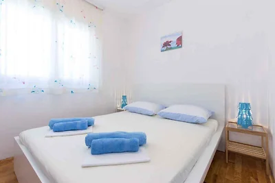 Ferienwohnung mit einer überdachten Terrasse