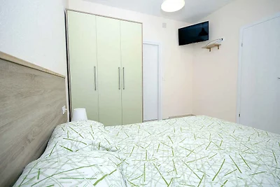 Ferienwohnung mit gemeinsamer Terrasse und