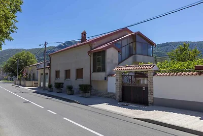 Appartamento Vacanza con famiglia Tribalj