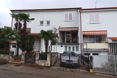 Ferienhaus mit Balkon und Klimaanlage