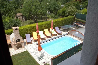 Ferienhaus mit Terrasse und Pool