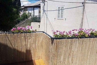 Ferienwohnung mit Terrasse und Gartenmöbel