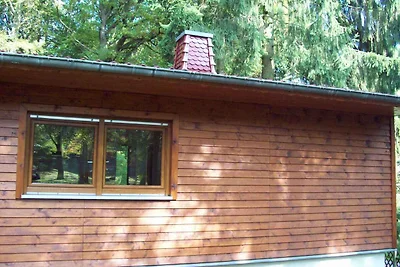 Ferienhaus mit Garten am Wald
