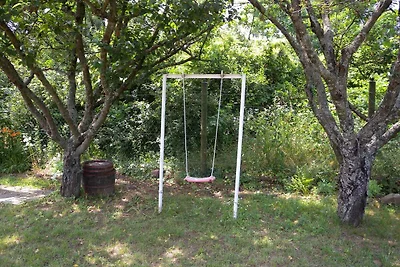 Ferienhaus mit Schaukel und Gartendusche