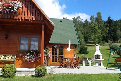 Ferienhaus mit Kamin und Sauna bei Wald