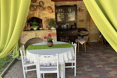 Ferienhaus mit Waschmaschine und Ofen im