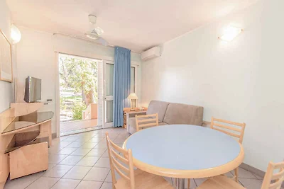 Bungalow mit Terrasse und Klimaanlage