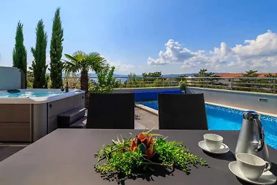 Ferienhaus mit Swimmingpool und Meerblick