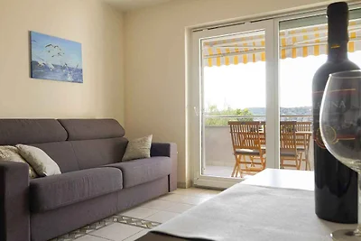 Ferienwohnung mit einen Balkon und Meerblick