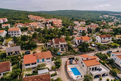 Ferienwohnung mit Meerblick und Pool